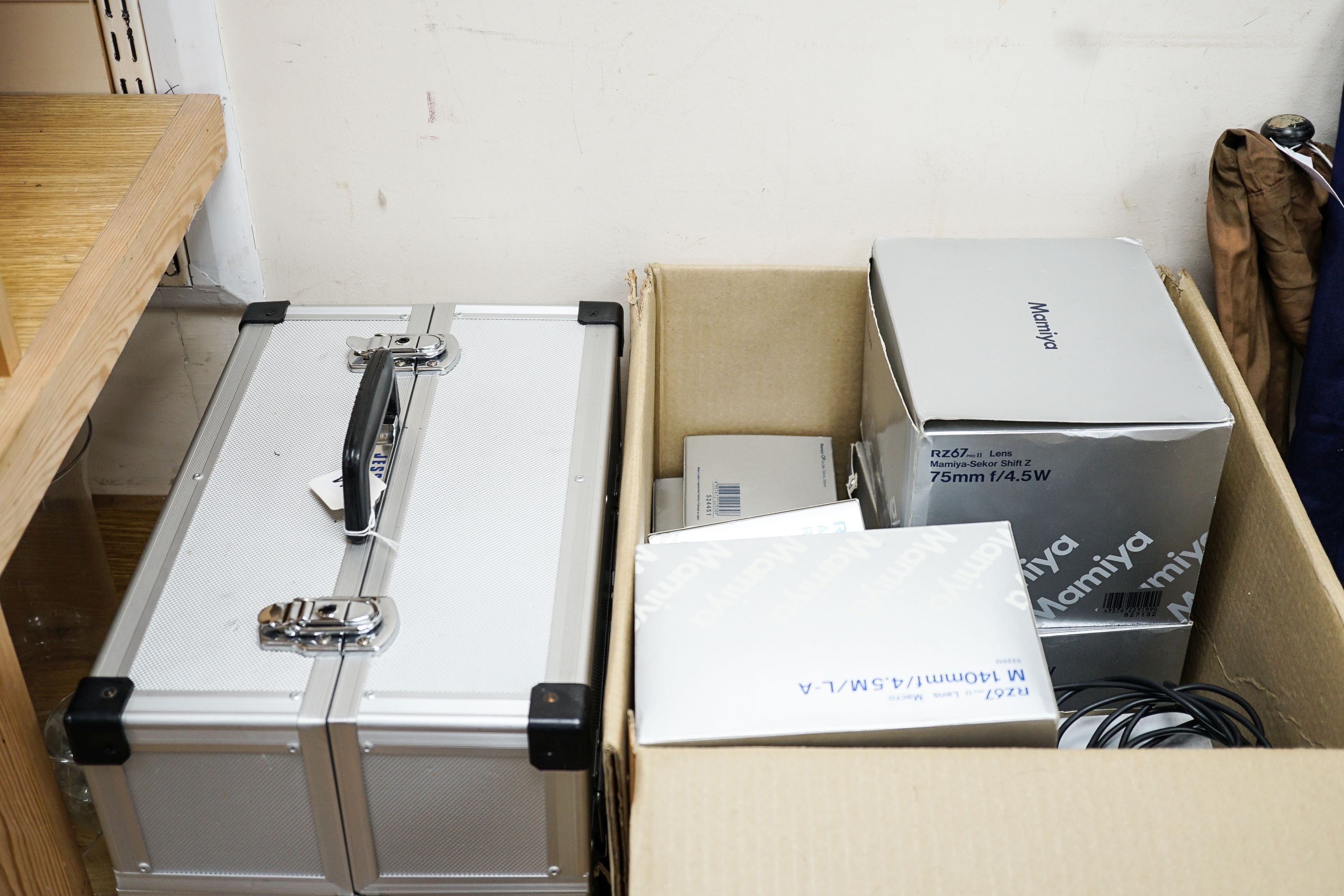 A Mamiya RZ67 camera with Sekor Shift 75mm f4.5, M140 mm f4.5 and 110mm f2.8 lenses, in a fitted case together the original boxes